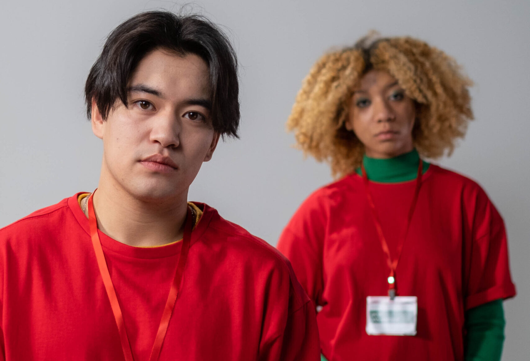 Man and woman in red crew neck shirt